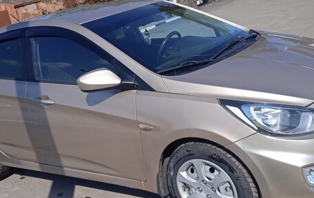 Hyundai Solaris II рестайлинг, 2011 год, 630 000 рублей, 2 фотография