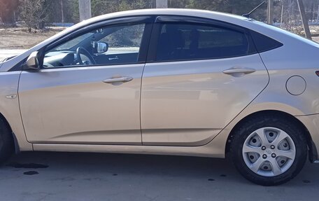 Hyundai Solaris II рестайлинг, 2011 год, 630 000 рублей, 5 фотография