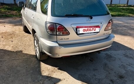 Lexus RX IV рестайлинг, 2001 год, 600 000 рублей, 8 фотография