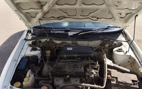 Mazda Familia Y10, 1997 год, 150 000 рублей, 4 фотография