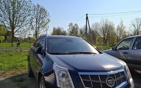 Cadillac SRX II рестайлинг, 2011 год, 980 000 рублей, 2 фотография