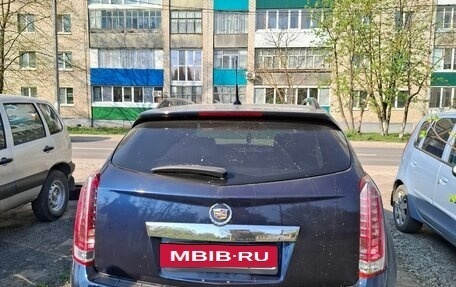 Cadillac SRX II рестайлинг, 2011 год, 980 000 рублей, 5 фотография