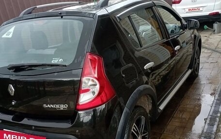 Renault Sandero I, 2013 год, 740 000 рублей, 2 фотография