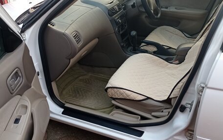 Nissan Sunny B15, 2004 год, 350 000 рублей, 6 фотография