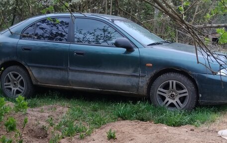 Mitsubishi Carisma I, 1998 год, 100 000 рублей, 3 фотография