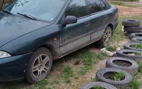 Mitsubishi Carisma I, 1998 год, 100 000 рублей, 5 фотография