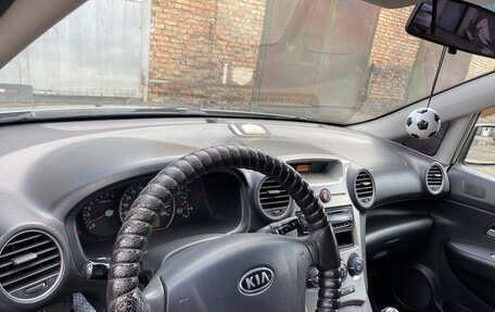 KIA Carens III (RP), 2009 год, 700 000 рублей, 17 фотография