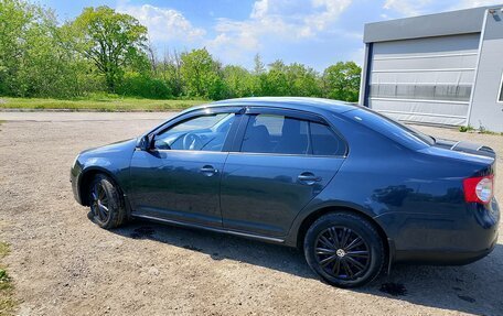 Volkswagen Jetta VI, 2010 год, 870 000 рублей, 3 фотография