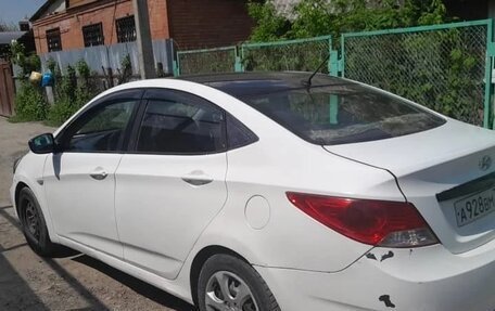Hyundai Solaris II рестайлинг, 2013 год, 350 000 рублей, 4 фотография