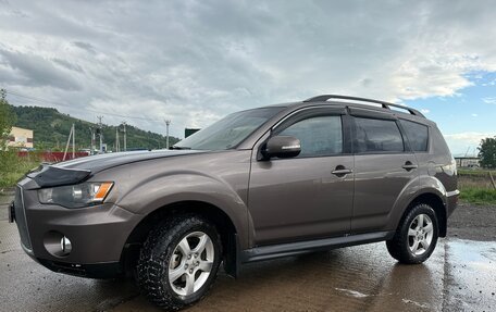 Mitsubishi Outlander III рестайлинг 3, 2011 год, 1 350 000 рублей, 2 фотография