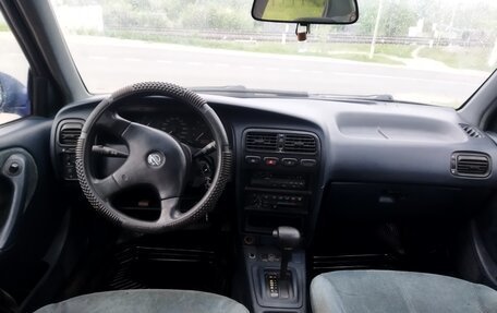 Nissan Primera II рестайлинг, 1992 год, 110 000 рублей, 11 фотография