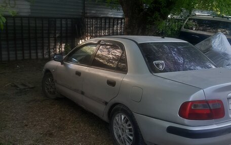 Mitsubishi Carisma I, 1999 год, 110 000 рублей, 1 фотография