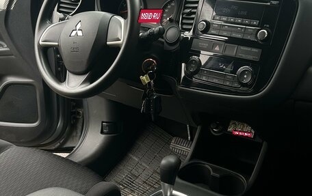 Mitsubishi Outlander III рестайлинг 3, 2013 год, 1 350 000 рублей, 9 фотография