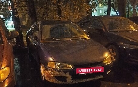 Mitsubishi Mirage VI рестайлинг, 1998 год, 210 000 рублей, 3 фотография