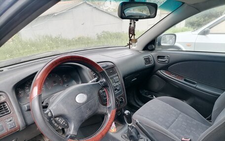 Toyota Avensis III рестайлинг, 2002 год, 390 000 рублей, 4 фотография