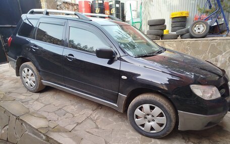 Mitsubishi Outlander III рестайлинг 3, 2007 год, 680 000 рублей, 2 фотография