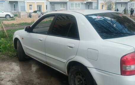 Mazda Familia, 2001 год, 200 000 рублей, 10 фотография
