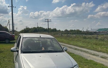 Renault Logan I, 2012 год, 590 000 рублей, 3 фотография