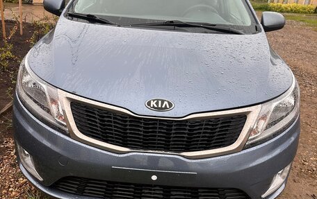 KIA Rio III рестайлинг, 2013 год, 875 000 рублей, 24 фотография