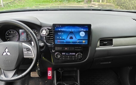 Mitsubishi Outlander III рестайлинг 3, 2013 год, 1 700 000 рублей, 17 фотография