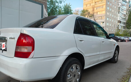 Mazda Familia, 2002 год, 300 000 рублей, 8 фотография