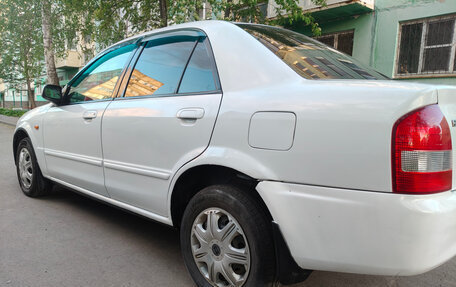 Mazda Familia, 2002 год, 300 000 рублей, 9 фотография