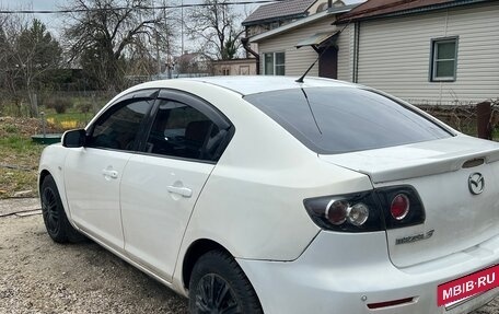 Mazda 3, 2008 год, 19 фотография