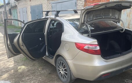 KIA Rio III рестайлинг, 2012 год, 710 000 рублей, 13 фотография