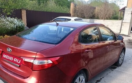 KIA Rio III рестайлинг, 2013 год, 749 000 рублей, 21 фотография