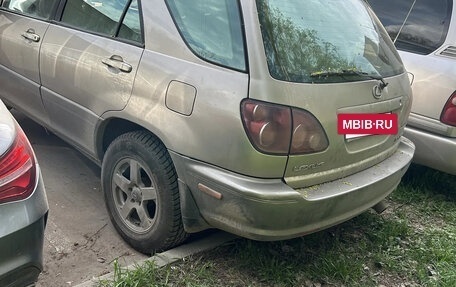 Lexus RX IV рестайлинг, 2000 год, 750 000 рублей, 3 фотография