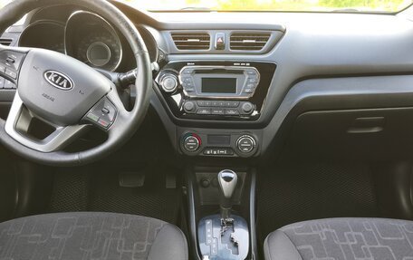 KIA Rio III рестайлинг, 2012 год, 1 100 000 рублей, 39 фотография