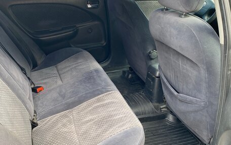 Toyota Avensis III рестайлинг, 2002 год, 399 000 рублей, 21 фотография