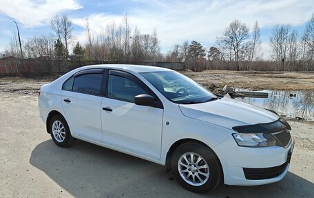 Skoda Rapid I, 2014 год, 1 050 000 рублей, 2 фотография