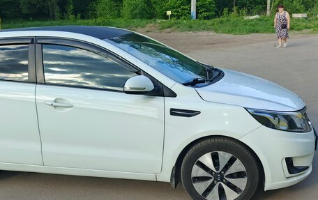 KIA Rio III рестайлинг, 2013 год, 890 000 рублей, 6 фотография