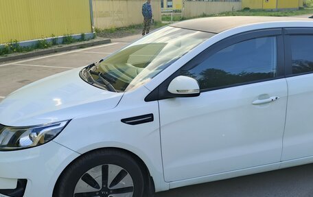 KIA Rio III рестайлинг, 2013 год, 890 000 рублей, 13 фотография