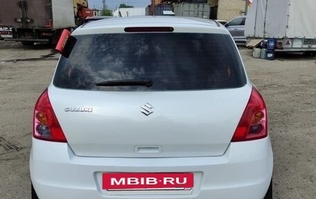 Suzuki Swift III, 2010 год, 720 000 рублей, 2 фотография