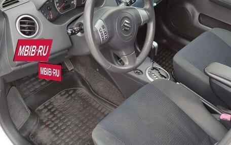 Suzuki Swift III, 2010 год, 720 000 рублей, 38 фотография