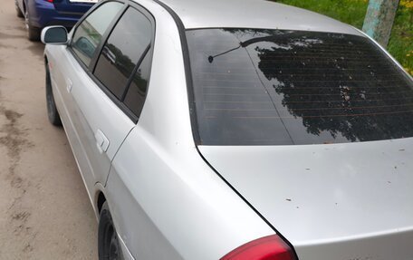 Mitsubishi Lancer VII, 1997 год, 130 000 рублей, 3 фотография