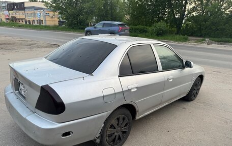 Mitsubishi Mirage VI рестайлинг, 2001 год, 45 000 рублей, 3 фотография