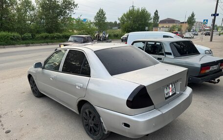 Mitsubishi Mirage VI рестайлинг, 2001 год, 45 000 рублей, 2 фотография