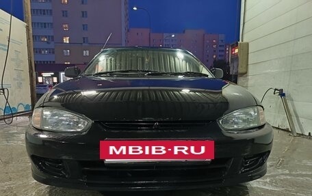 Mitsubishi Mirage VI рестайлинг, 1996 год, 165 000 рублей, 6 фотография