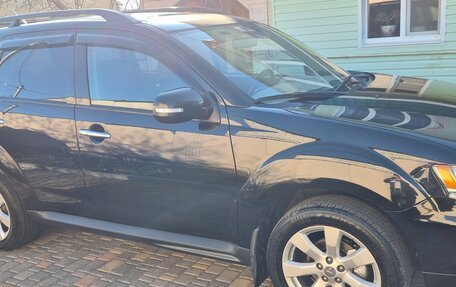 Mitsubishi Outlander III рестайлинг 3, 2011 год, 1 250 000 рублей, 9 фотография