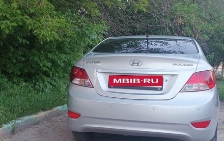 Hyundai Solaris II рестайлинг, 2011 год, 670 000 рублей, 12 фотография