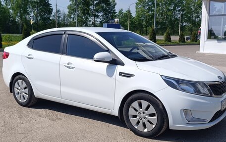 KIA Rio III рестайлинг, 2012 год, 750 000 рублей, 9 фотография