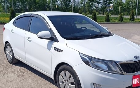 KIA Rio III рестайлинг, 2012 год, 750 000 рублей, 10 фотография