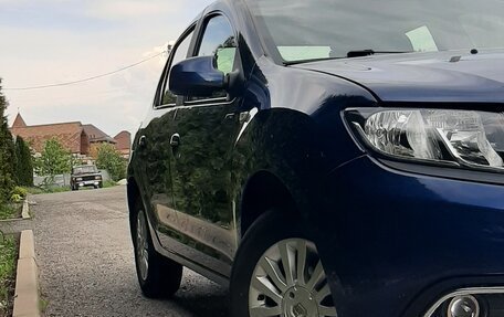 Renault Logan II, 2017 год, 860 000 рублей, 13 фотография