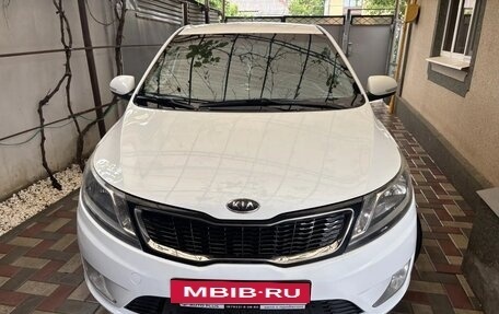KIA Rio III рестайлинг, 2013 год, 940 000 рублей, 3 фотография