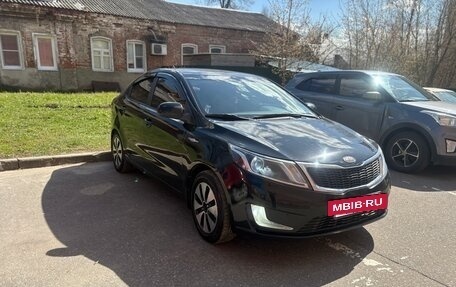 KIA Rio III рестайлинг, 2012 год, 730 000 рублей, 2 фотография