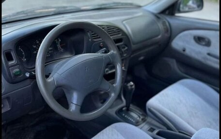 Mitsubishi Mirage VI рестайлинг, 1999 год, 170 000 рублей, 15 фотография