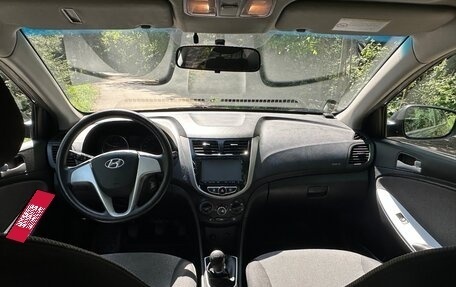 Hyundai Solaris II рестайлинг, 2011 год, 975 000 рублей, 24 фотография